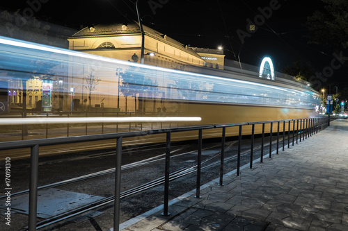Canvas Print Tram passing at night in Deak Ferenc Ter, Budapest