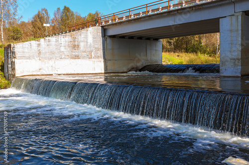 Waterfall on the river Suenga under a highway bridge. Siberia  Russia