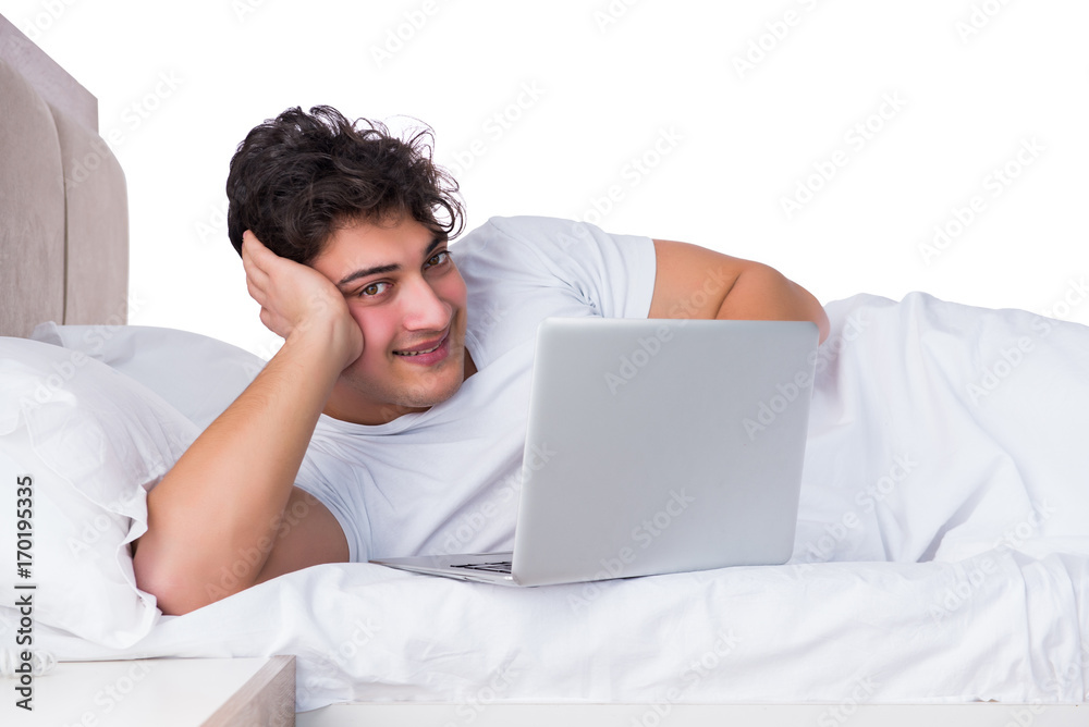 Man in bed suffering from insomnia Man in bed suffering from insomnia
