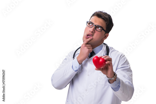 Young male cardiologist doctor holding a heart isolated on white © Elnur