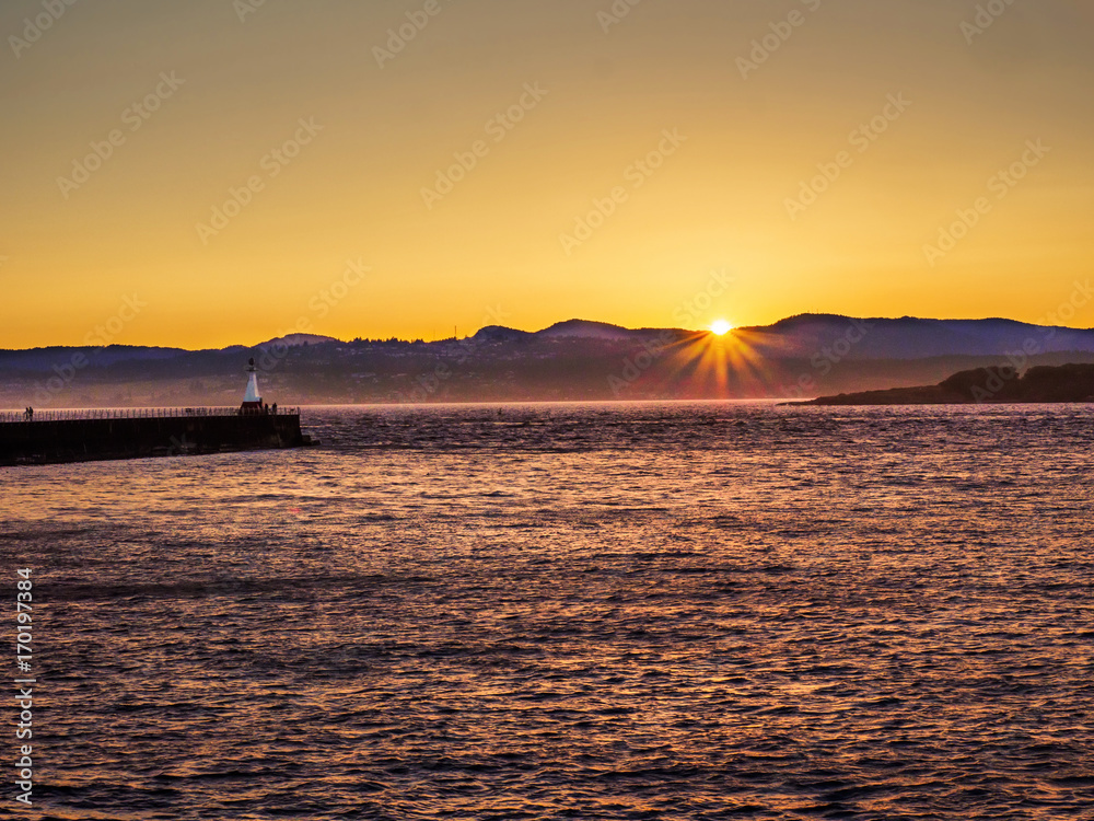 Breakwater at the Ogden Point in Victoria, BC, Canada;  sunset time