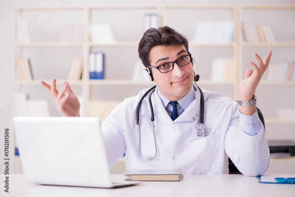 Young man doctor in medical concept Young man doctor in medical concept