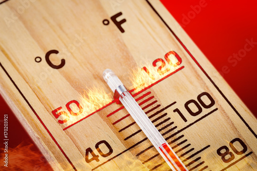Close-up wooden thermometer scale 40 Degrees. Hot summer day. photo