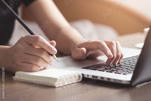 Business woman working on desk. Business and technology concept. photo