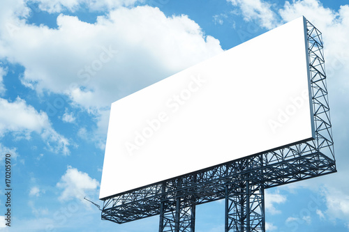 Big blank billboard on blue sky. with clipping path
