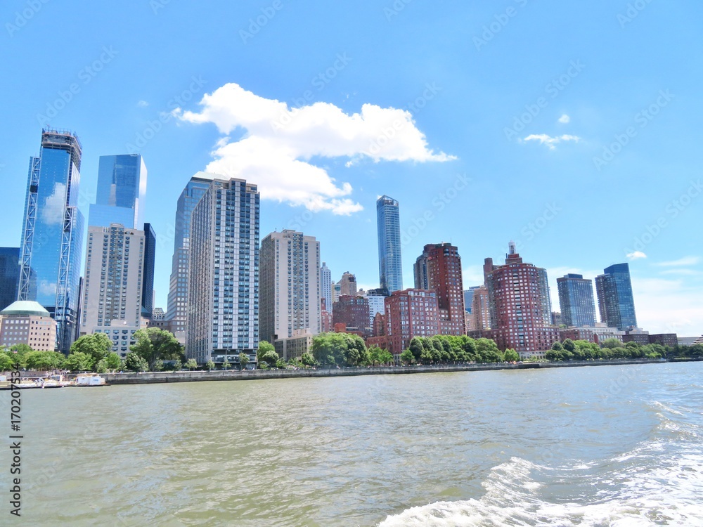 Downtown New York City skyline with the Hudson River in the foreground Downtown New York City skyline with the Hudson River in the foreground