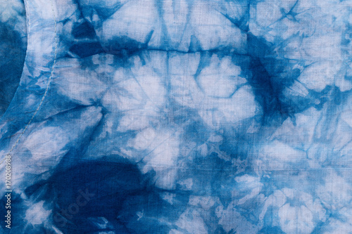 Fototapeta Naklejka Na Ścianę i Meble -  Pattern of blue dye on cotton cloth, Dyed indigo fabric background and textured