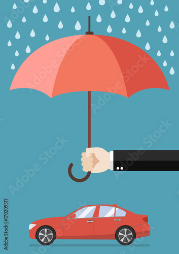 Hand holding an umbrella protecting car