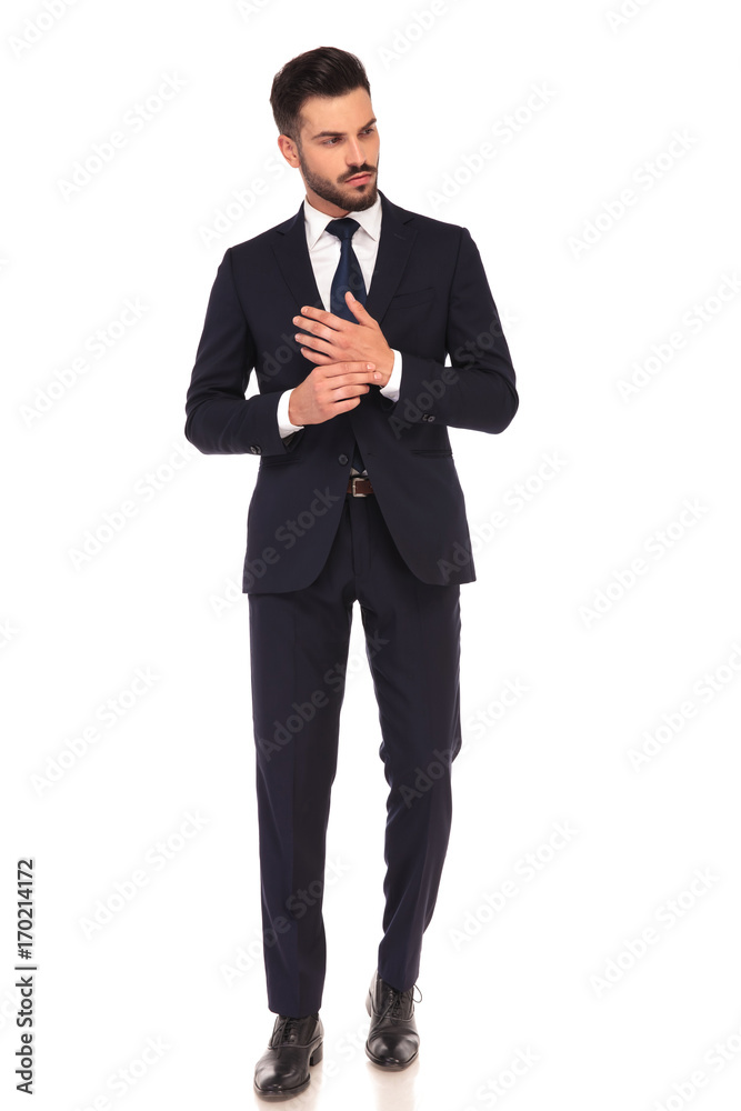 fashion young business man holding palms together fashion young business man holding palms together