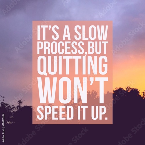 Inspirational motivational quote "It's a slow process,but quitting won't speed it up" on sunrise sky background.
