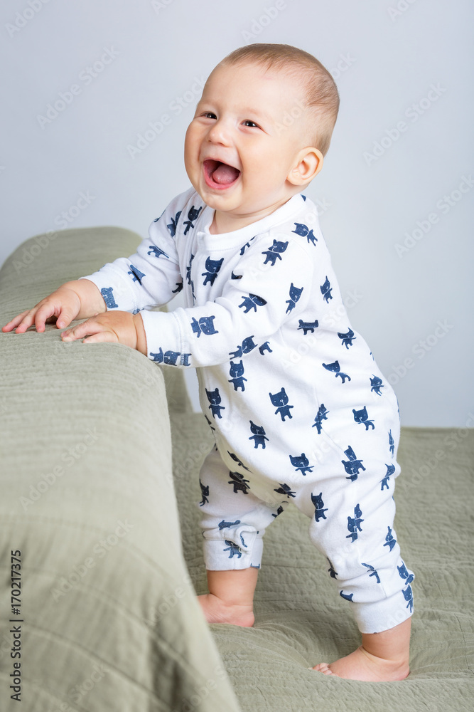 Fototapeta premium Portrait of a happy child. Cheerful baby