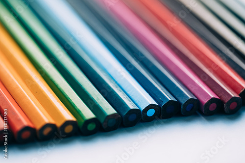 Many colored pencils for drawing. photo