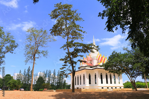 Beautiful white temple under the blue sky in thailand
