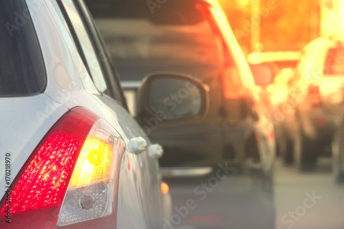 Traffic jam on the bangkok-thailand road in evening time, eye vision in the mirror car 