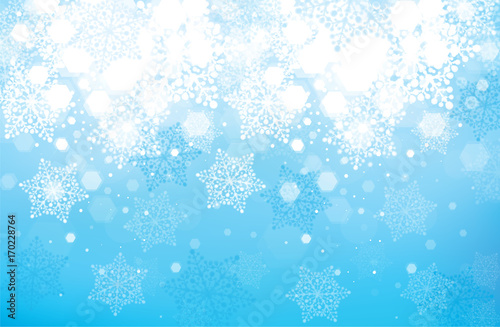 Vector blue snowflakes background for Christmas design.