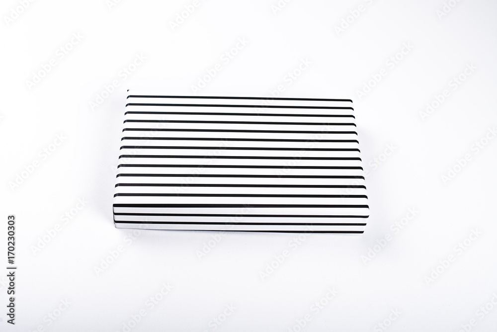 Top view of white box with black racks on white background. Isolated. Top view of white box with black racks on white background. Isolated.