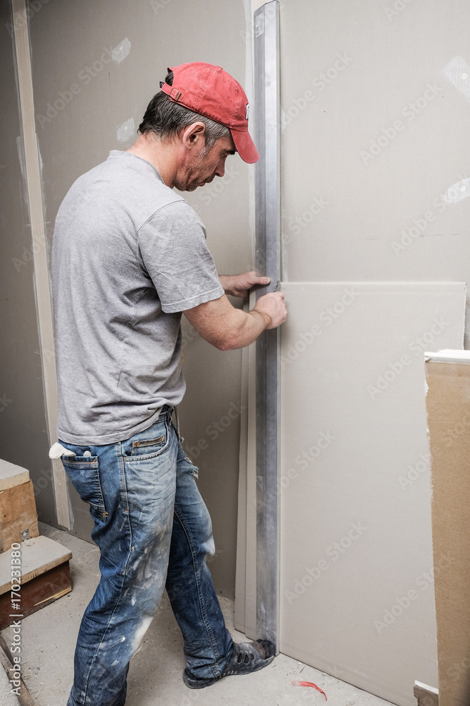 workers make repairs in the apartment