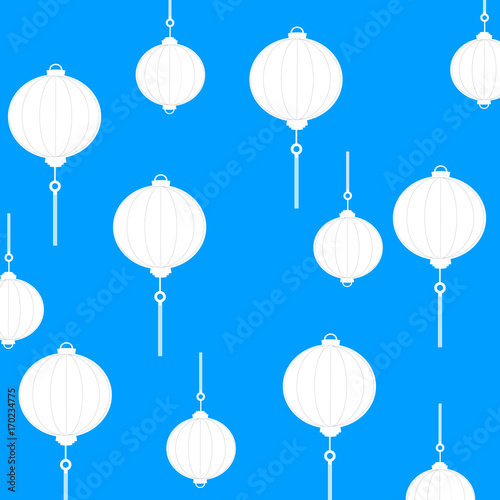 white Chinese lanterns on blue background