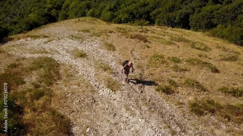 A traveler is hiking in Pyatigorsk in Stavropol region of Russia on the Beshtau mountain photo