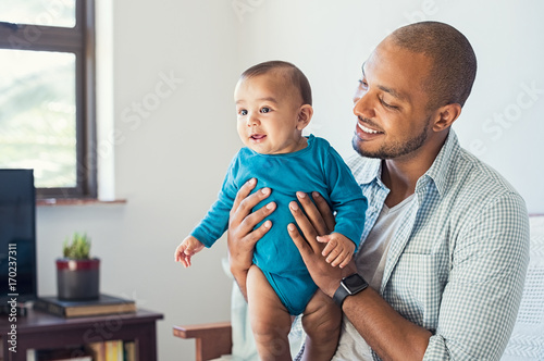 Father playing with baby