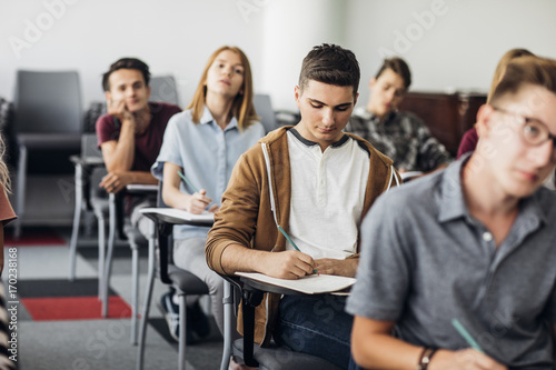 High School Students Sitting at Classroom