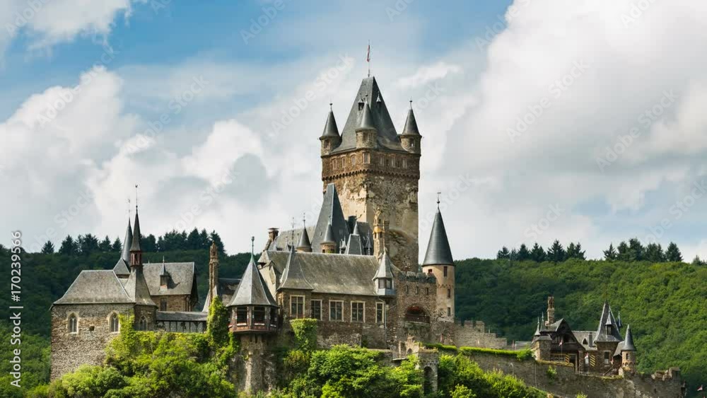 Summer timelapse sequence of the Reichsburg Cochem in the Moselle Valley in Germany with fast moving clouds in the background in 4K resoultion. Summer timelapse sequence of the Reichsburg Cochem in the Moselle Valley in Germany with fast moving clouds in the background in 4K resoultion.