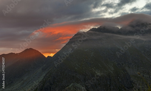 Colorful summer sunrise in the mountains.