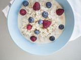 Healthy breakfast - oatmeal with blueberries and raspberries