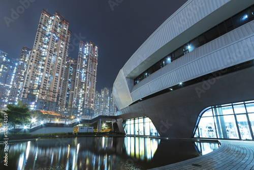 Modern architecture in Park and high rise residential building in Hong Kong city at night