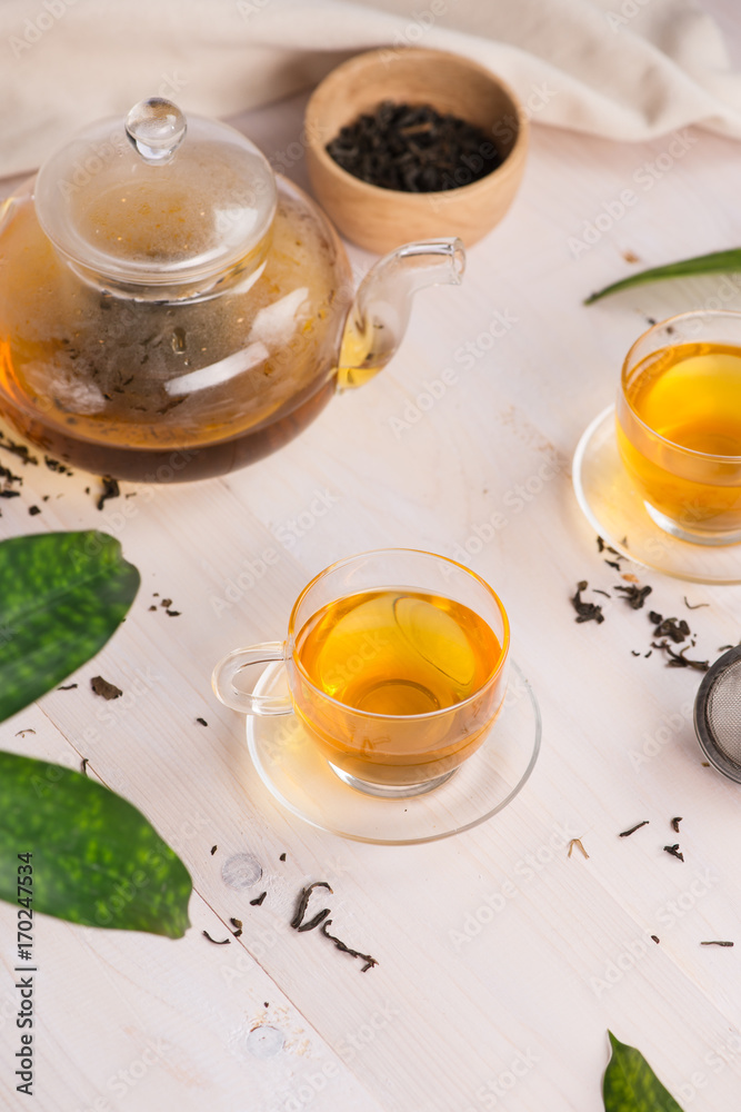 Cups of tea on wooden table background Cups of tea on wooden table background