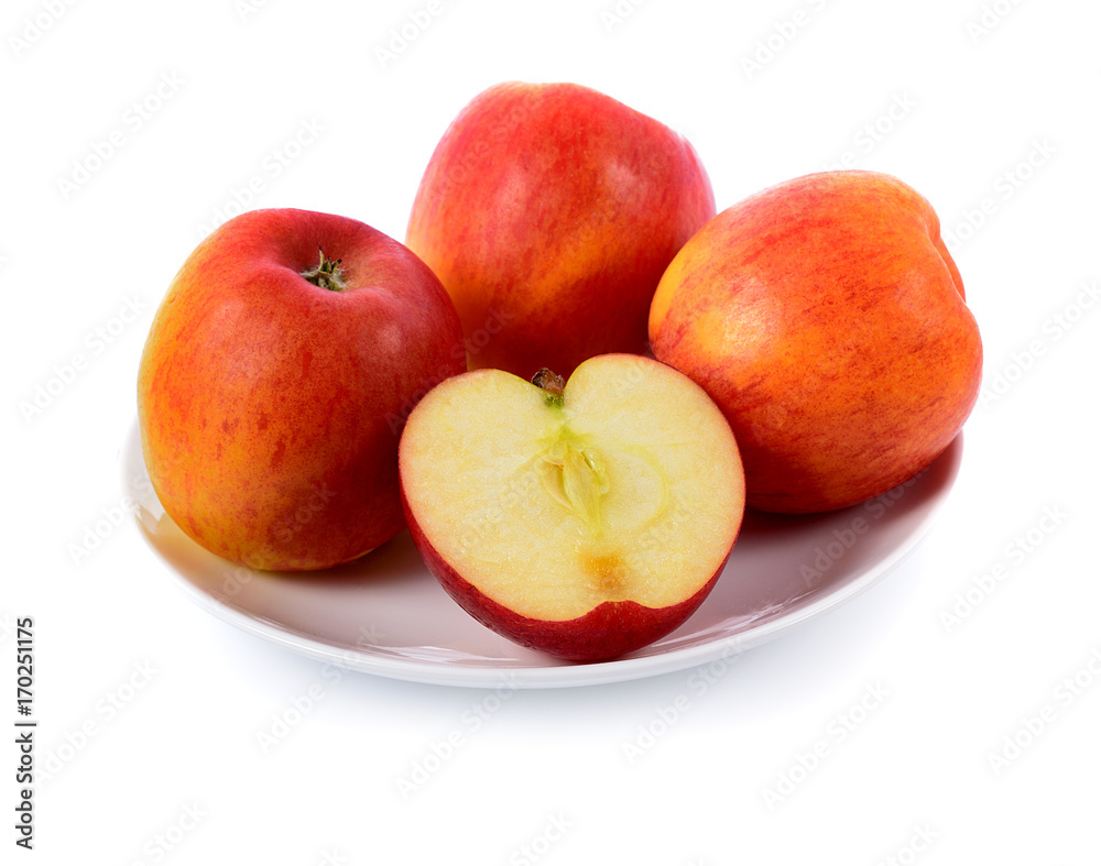 red apple in white plate isolated on white background red apple in white plate isolated on white background