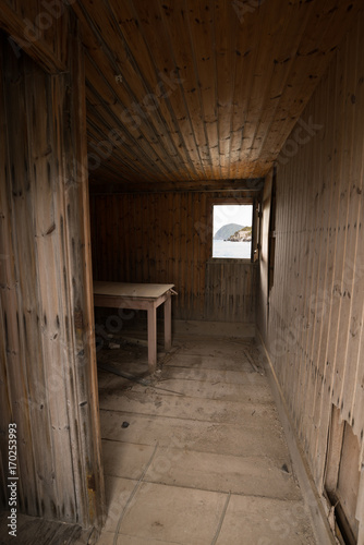 Deserted barrack on a shipping pier of an abandoned mine