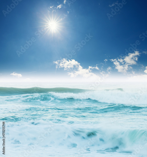 Atlantic ocean big waves seascape under blue sky