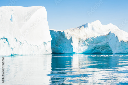 Big icebergs floating in the Ilulissat icefjord, Greenland © smallredgirl