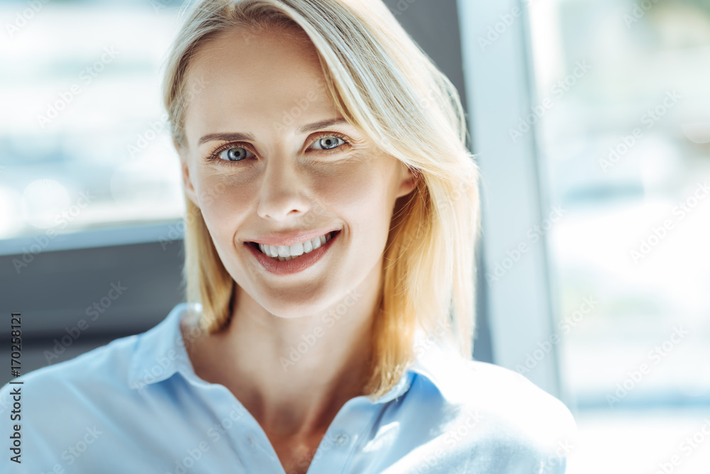 Portrait of a beautiful cheerful fair-haired woman Portrait of a beautiful cheerful fair-haired woman