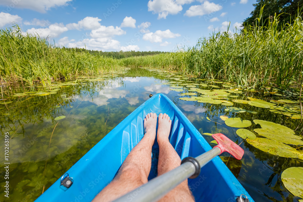 Fototapeta premium Kayaking on the river in the summer.