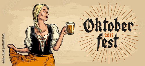 Young sexy Oktoberfest girl dirndl dancing and holding beer mug.