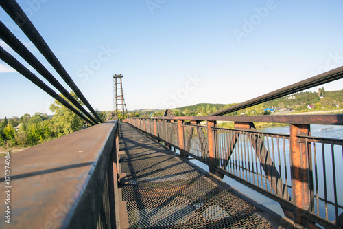 the river Kondoma,suspension bridge,Russia