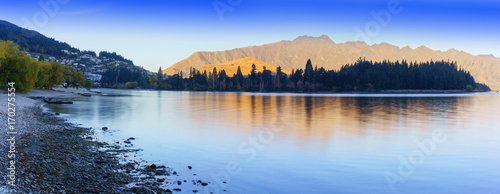 Panoramic beautiful serenity of Lake Wakatipu in Queenstown in Autumn , South Island of New Zealand