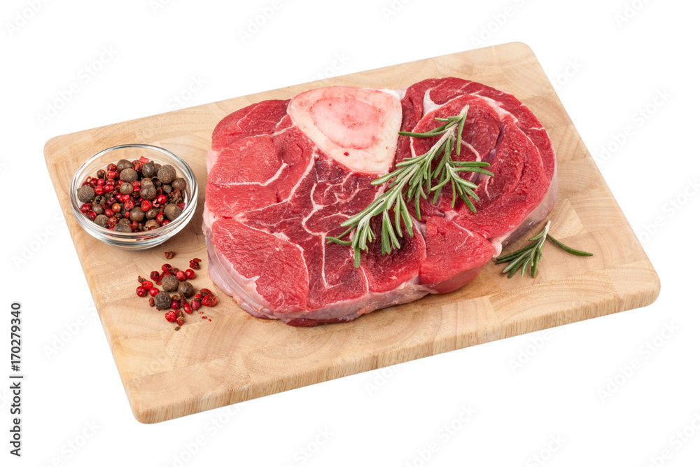Fresh raw beef steak with bone on cutting board on white background