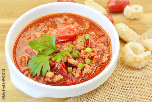 Northern Thai Meat and Tomato Spicy Dip ( Thai name is Nam prik ong)
Thai food menu with tomatoes.