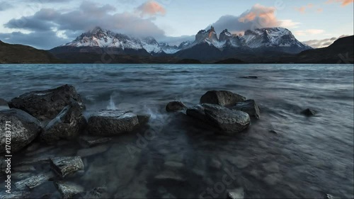 Time Lapse. Dawn in Torres del Paine, Patagonia, Chile, over Lago Pehoe - Southern Patagonian Ice Field, Magellanes Region of South America.  photo