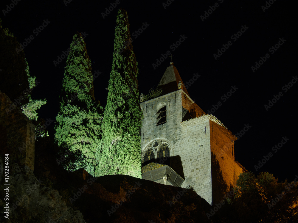 A view of the illuminated chapel Notre-Dame de Beauvoir In the French town of Moustiers-Sainte-Marie in France.