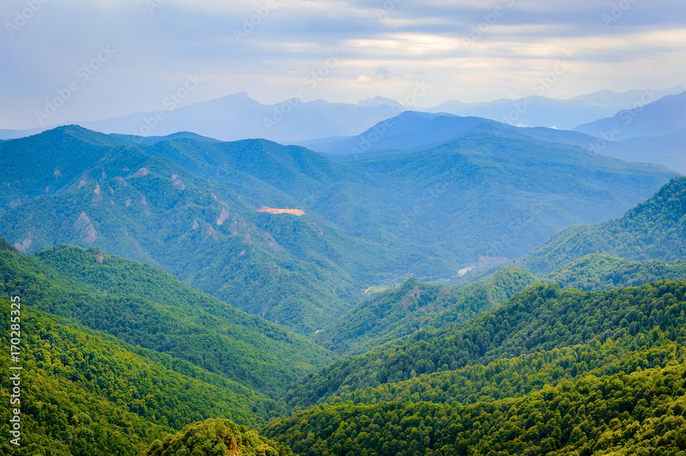 Mountain forest landscape at the foot of the Caucasus Mountains, Adygea, Russia