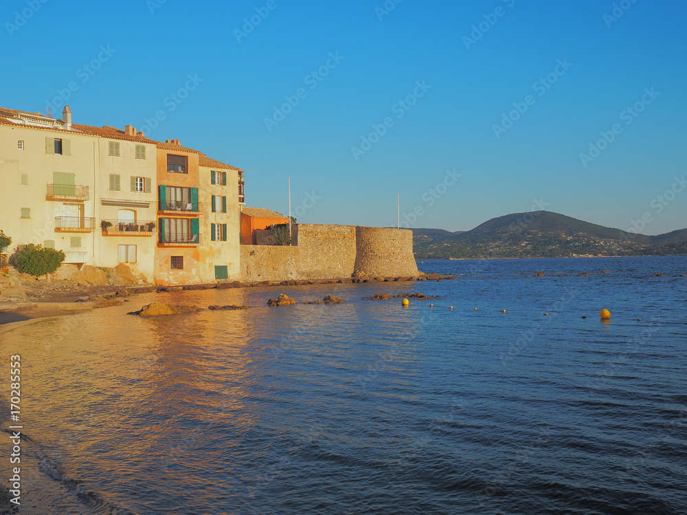The buildings along the coastline of Saint Tropez, on an early summer morning.
