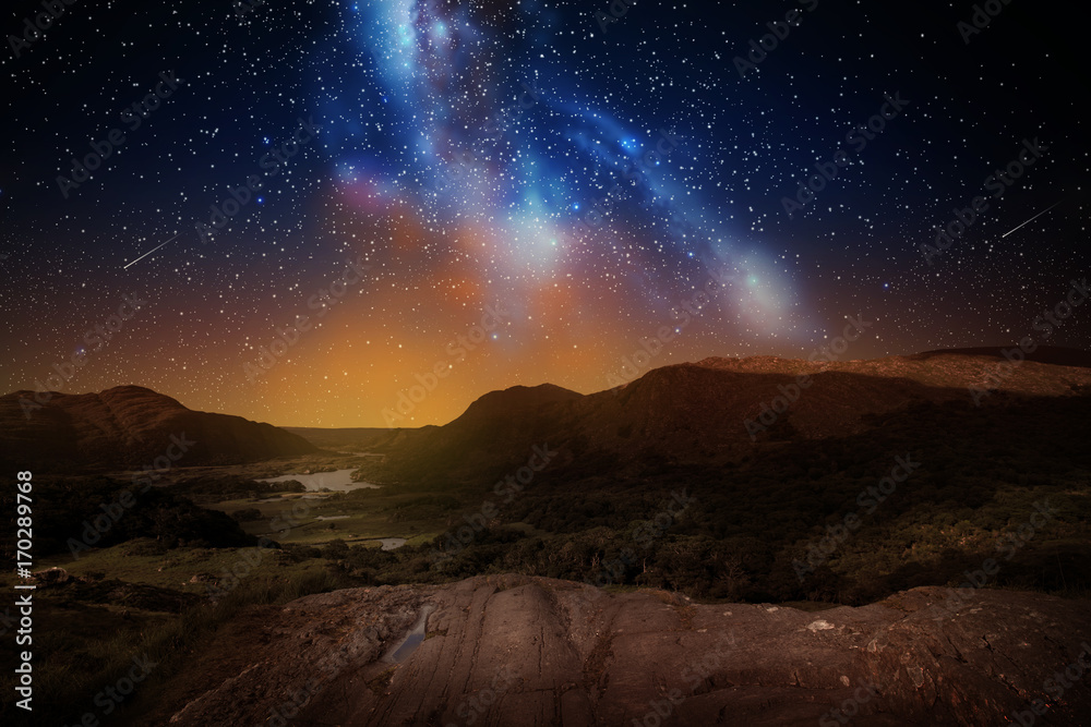 mountain landscape over night sky or space
