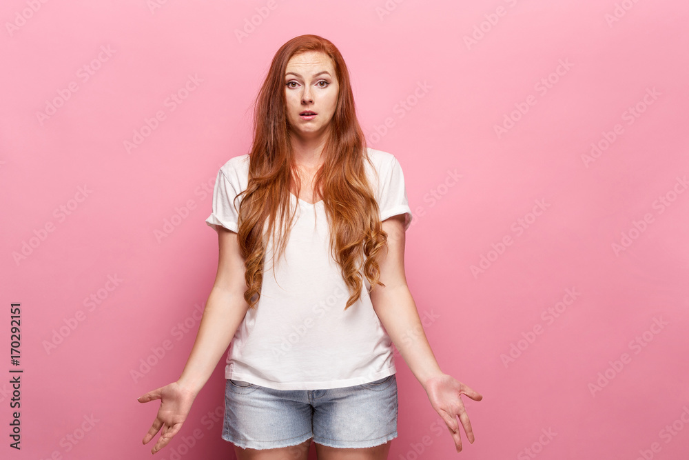 The beautiful woman is offended on pink studio The beautiful woman is offended on pink studio
