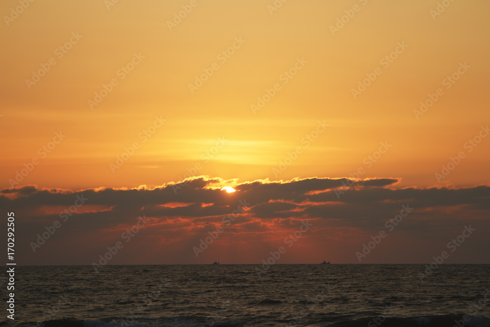 Evening scene with sunset on the sea
