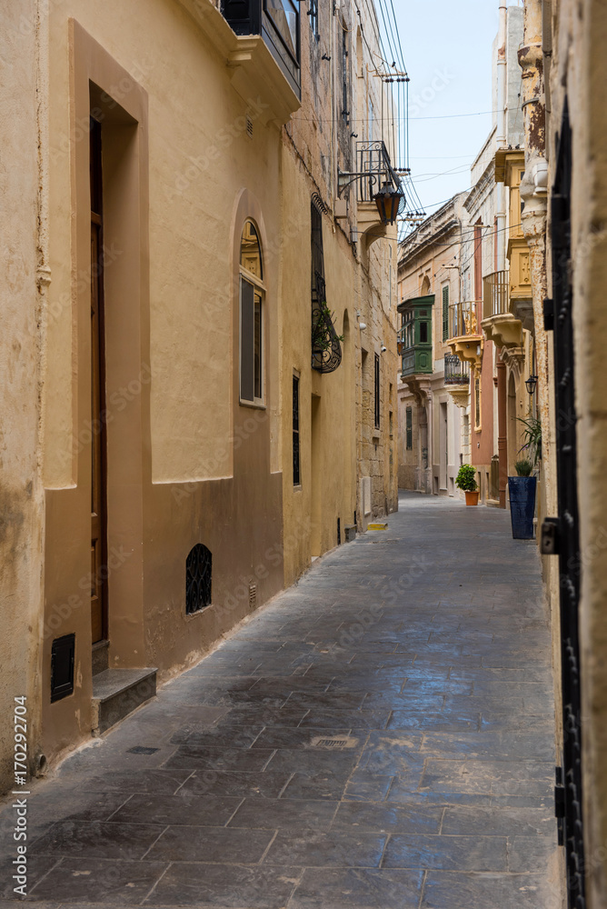 Narrow street in Mosta, Malta
