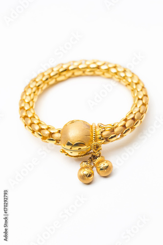 gold bangle with dollar sign